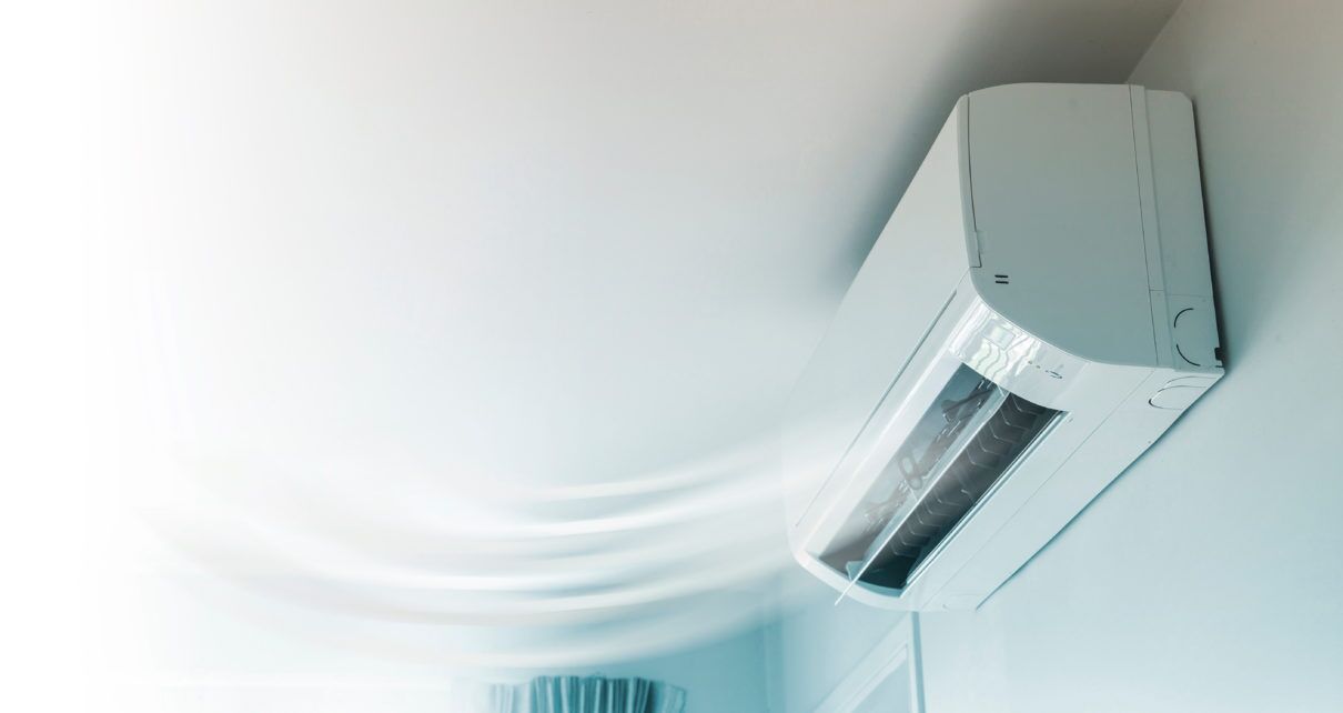 whole house air purifier mounted high on wall shown circulating air